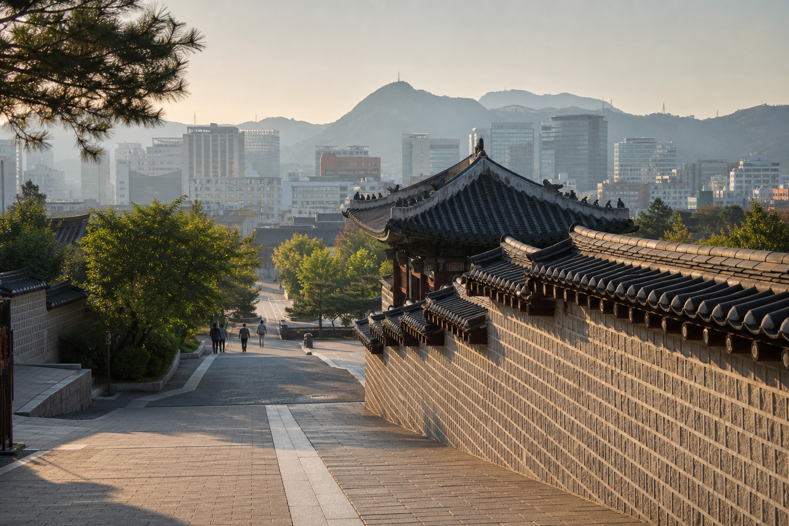 Photorealistic Seoul walkway beside a traditional tiled wall with the modern city and mountains beyond